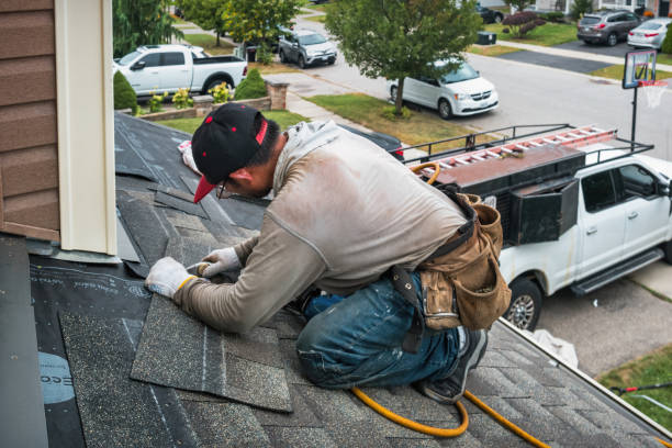 Professional Gutter Installation technician working in Greensboro, NC